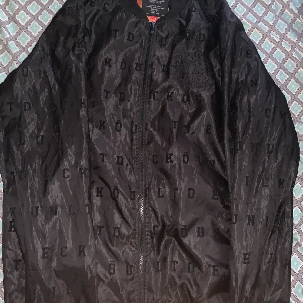 Marc Ecko black bomber jacket ( Monogram Name printing) size large ( L )